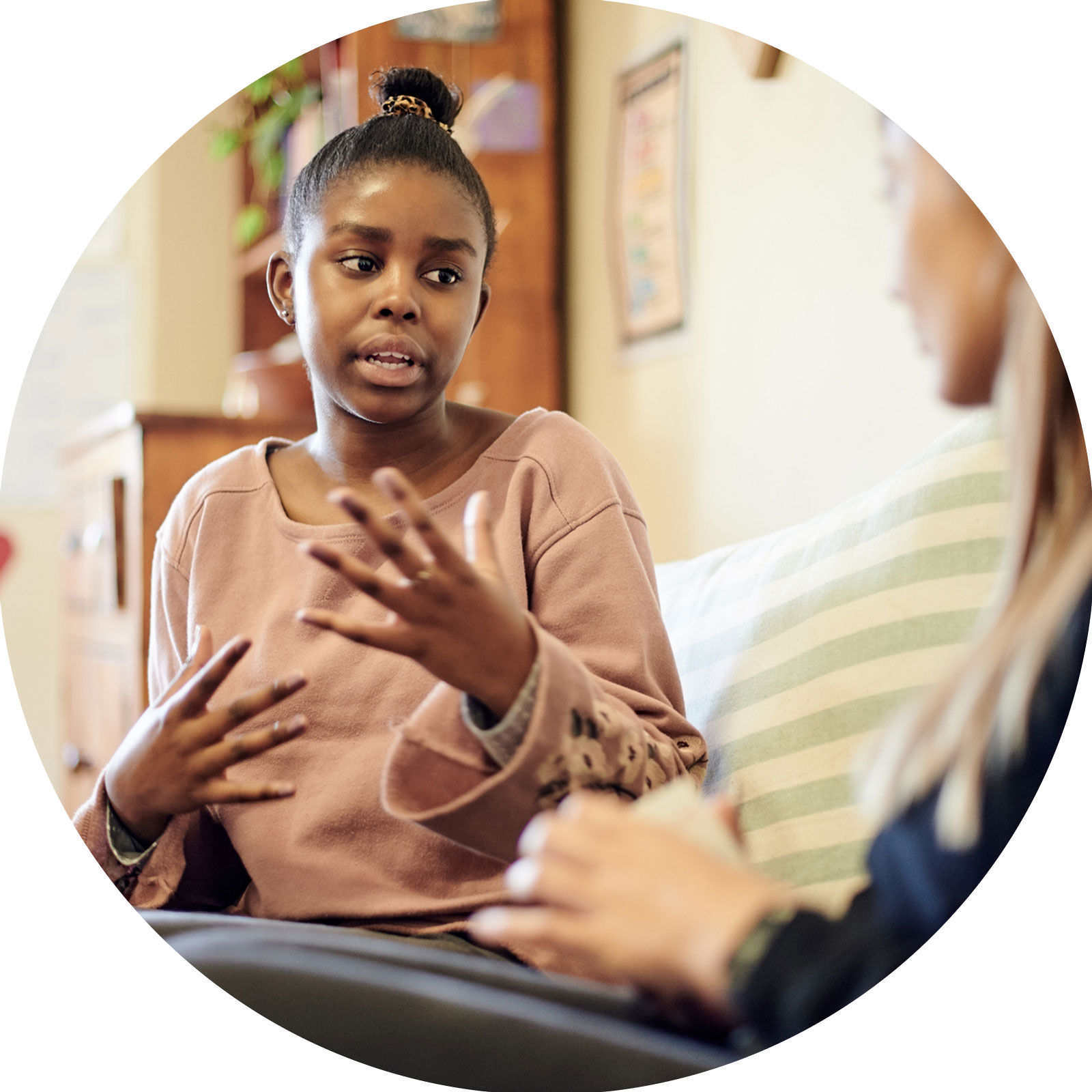 young woman talking to carer